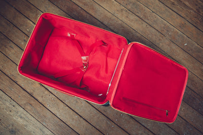 The Crown Collection Red Roller Luggage