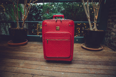 The Crown Collection Red Roller Luggage